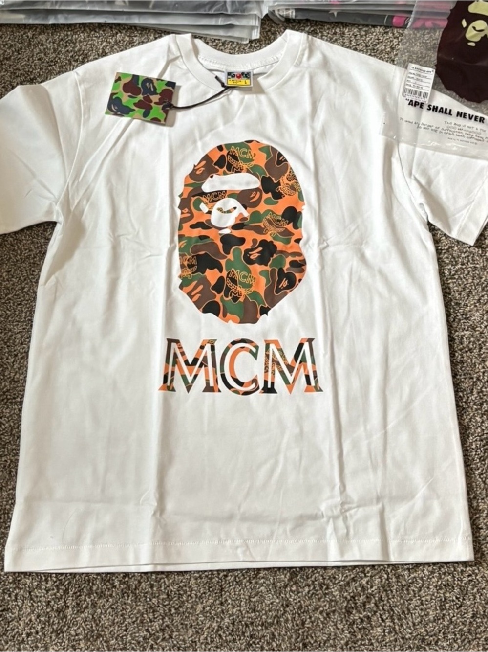 MCM White Tee with Orange, Green & Black Camo Ape Logo